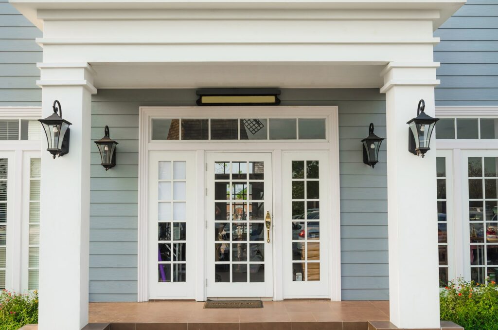 Front door on a blue home