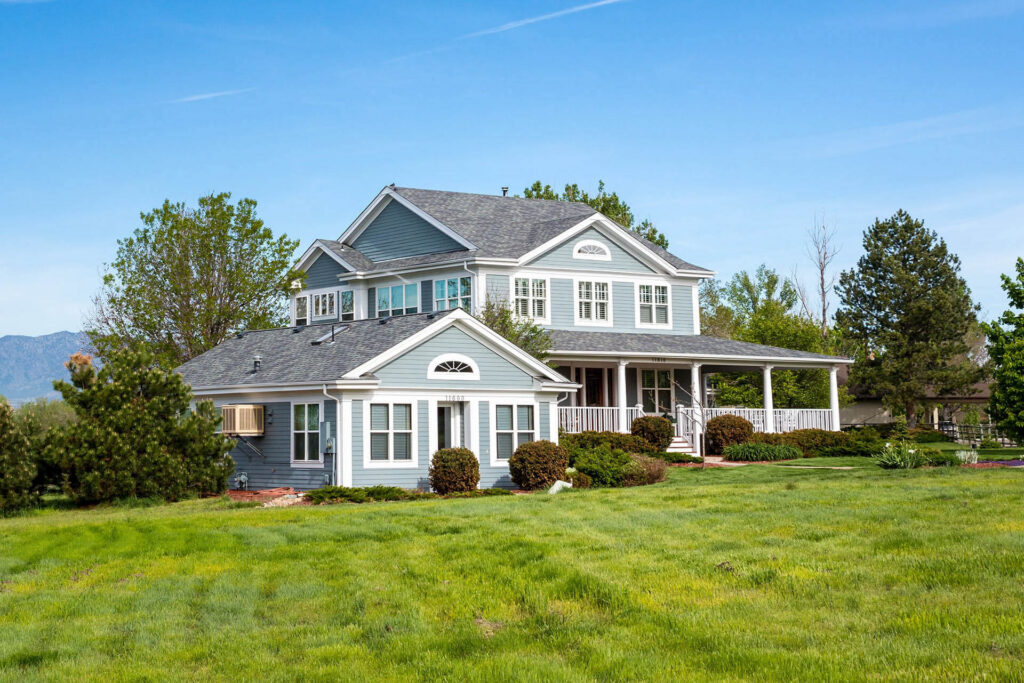 Front exterior of large, ranch style home